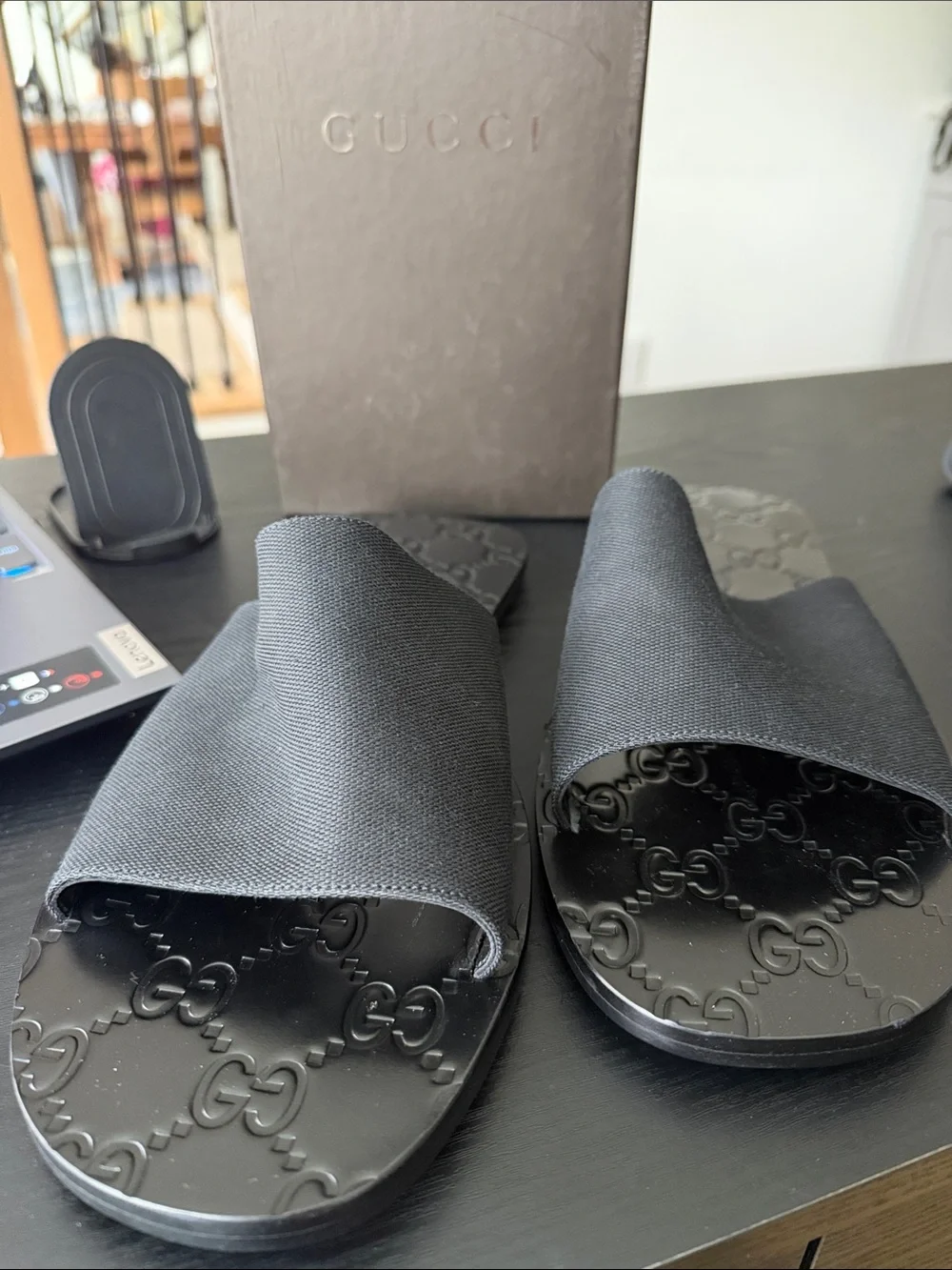 Gucci Men’s Black Embossed Logo Slide Sandals
